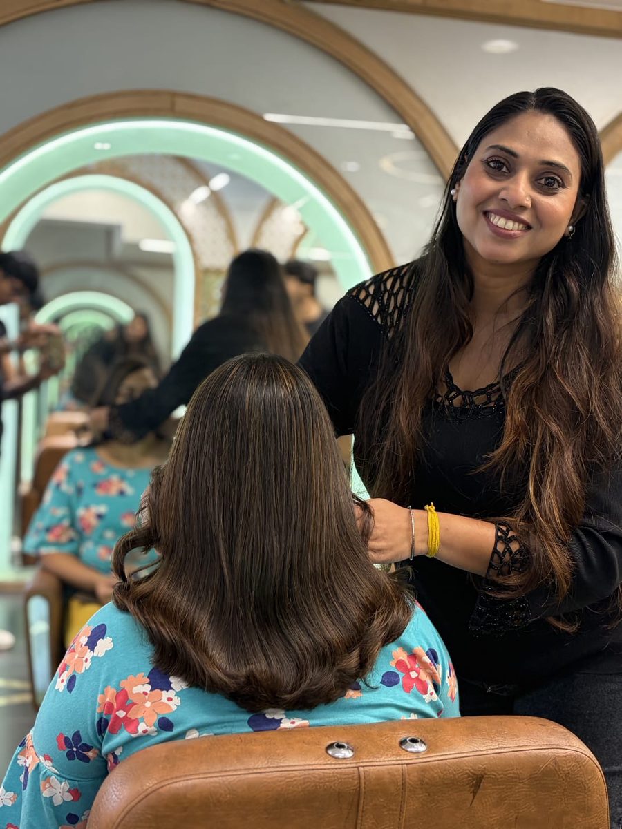 Inside Monsoon Salon — styling station with warm ambient lighting